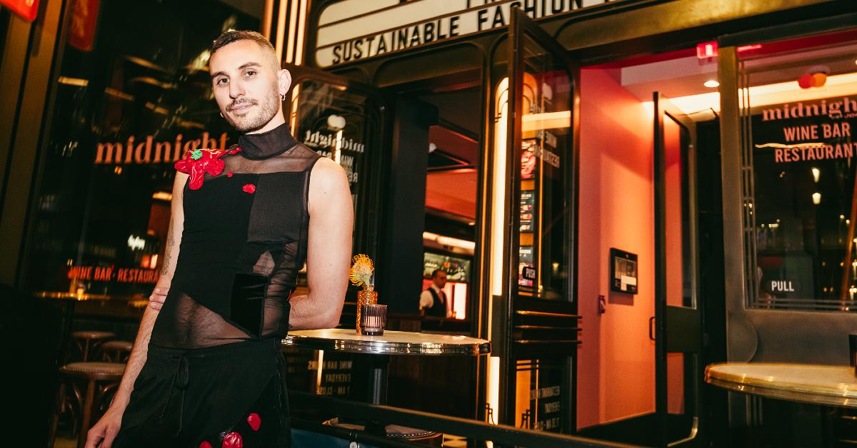 Designer Daniel Silverstein — aka Zero Waste Daniel — posing in front of Manhattan's Midnight Theatre after his "Sustainable Fashion Is a Cabaret" fashion show on Sept. 9, 2024